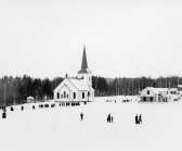 Degerfors kyrka i vinterskrud år 1900.